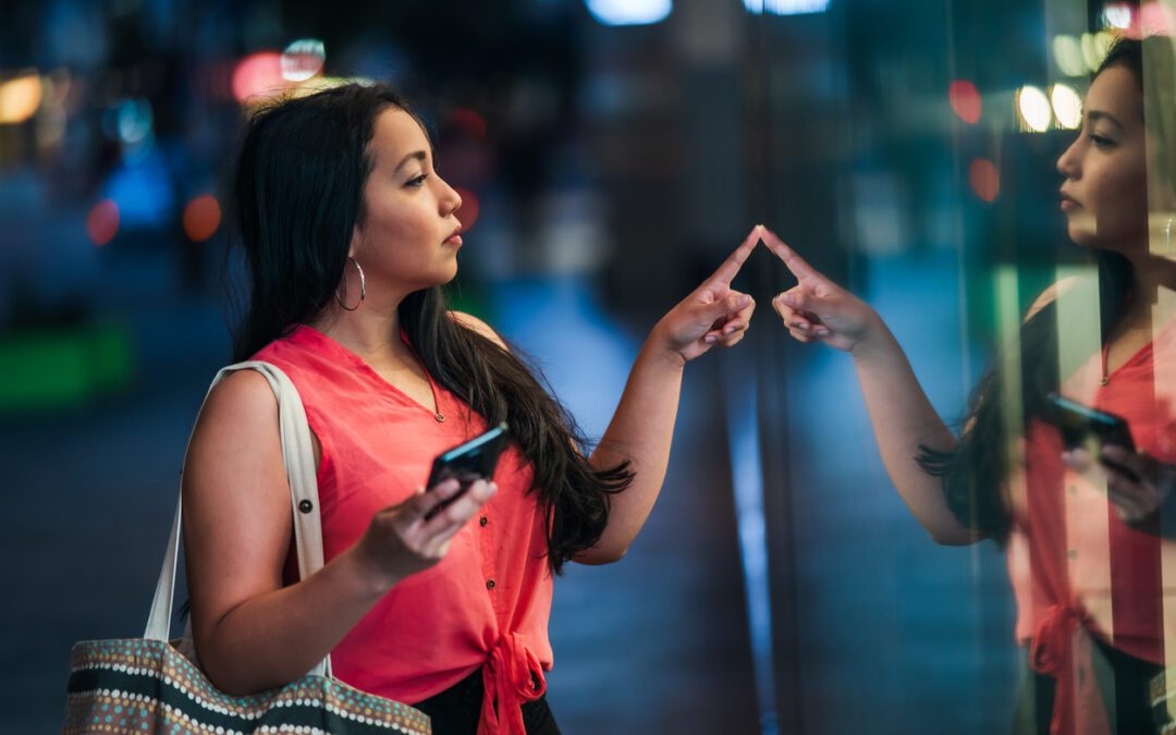 Young woman window shopping.